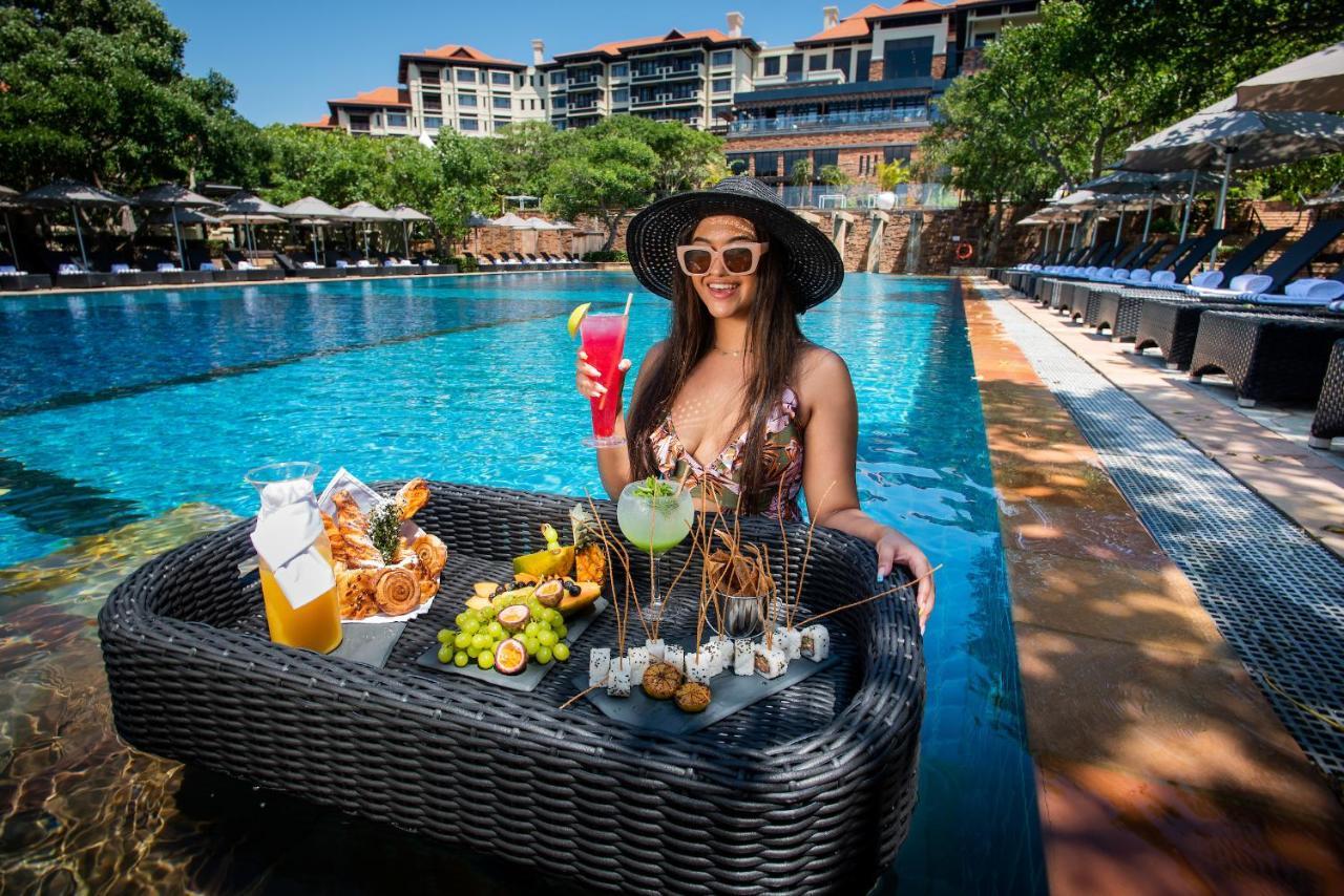 Hotel The Capital Zimbali Ballito Exteriér fotografie Poolside at the hotel