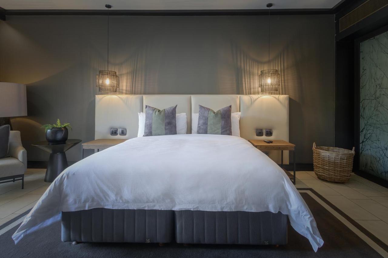 Hotel The Capital Zimbali Ballito Exteriér fotografie A bedroom at The Ivy Hotel